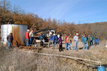 Members of the Osage Nation Environmental and Natural Resources Department, the Bureau of Indian Affairs, the U.S. Army Corps of Engineers, the Department of Energy, and the U.S. Environmental Protection Agency listen to U.S. Geological Survey scientists describe the history of hydrocarbon development in Oklahoma.  Photographer: Kathy D. Peter, USGS.